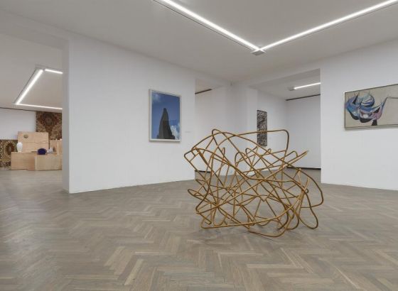 Pictures hung in the space of the Arsenał Gallery, white walls